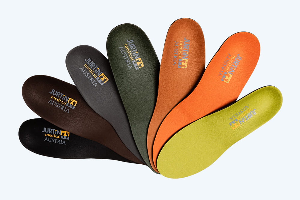 Sieben Einlagen aufgefächert in verschiedenen Farben